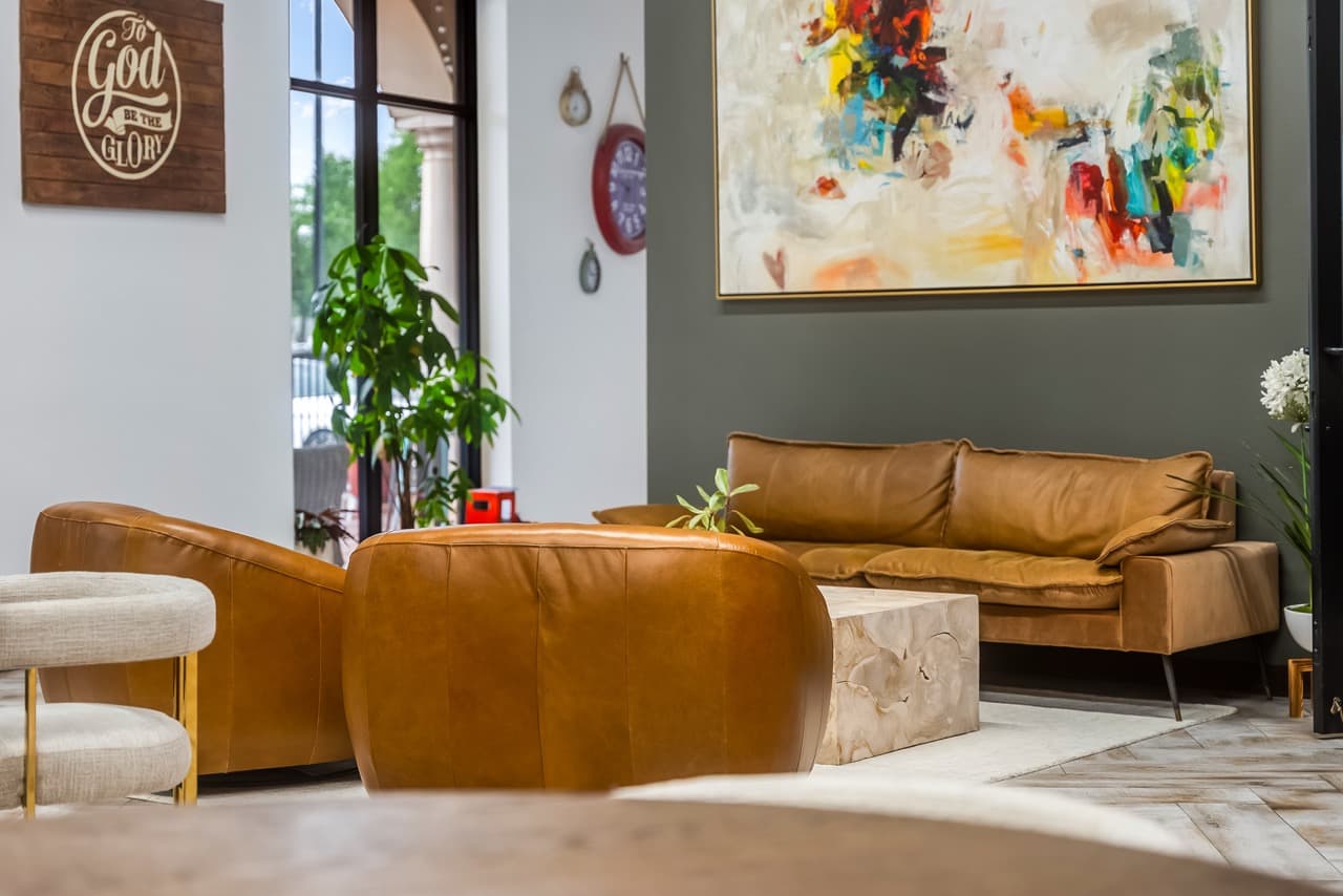 Leather sofas and art in the WorkLodge lounge